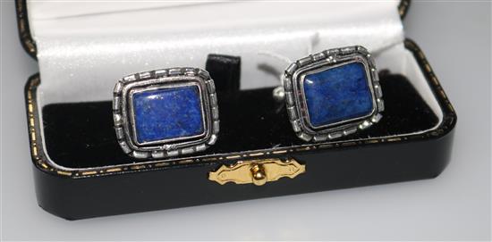 A cased modern pair of silver and lapis lazuli set cufflinks.